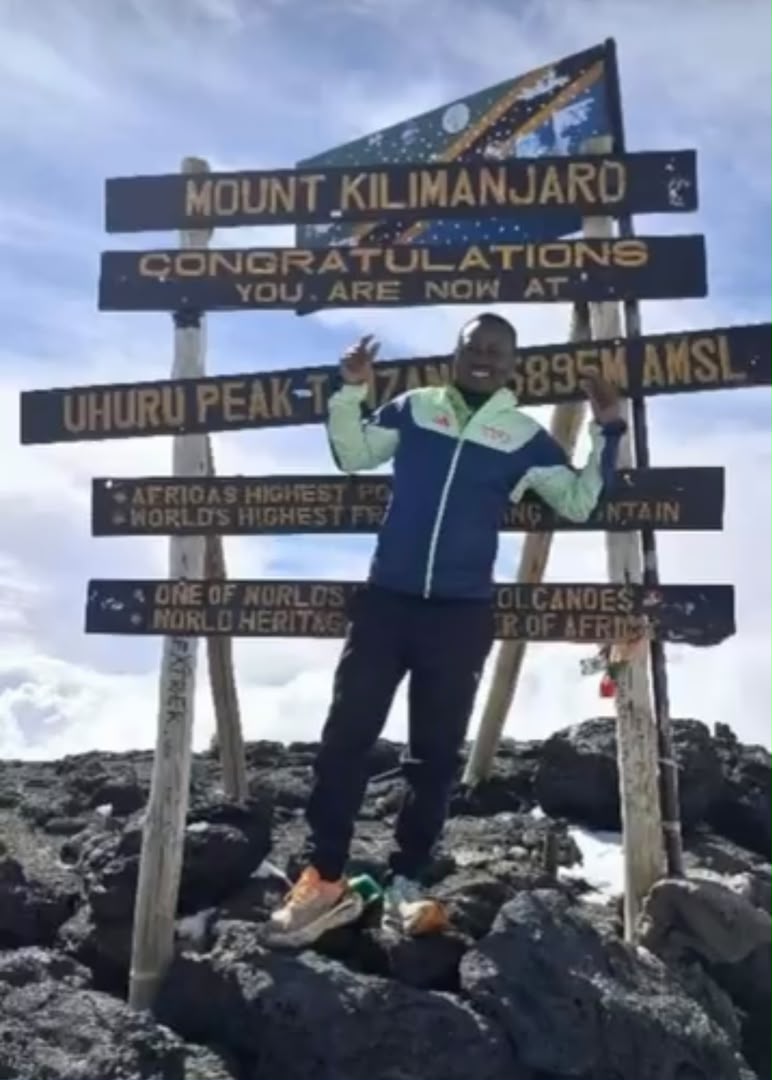 Guide at Uhuru Peak, Mount Kilimanjaro 5,895m